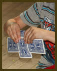 Students learning a card trick at a Secret Stuff workshop